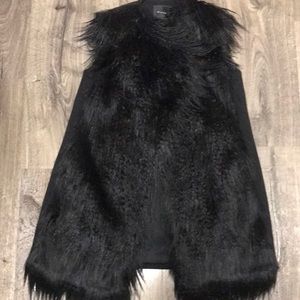 Black faux fur theory vest